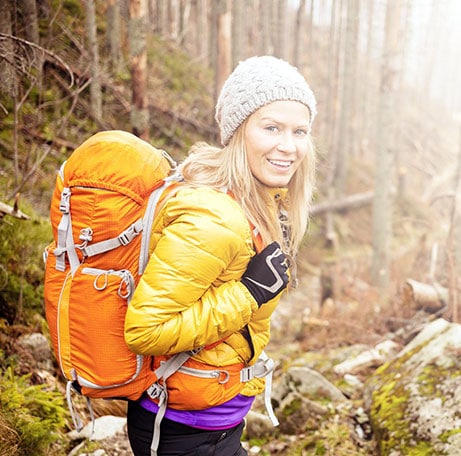 woman hiking in forest